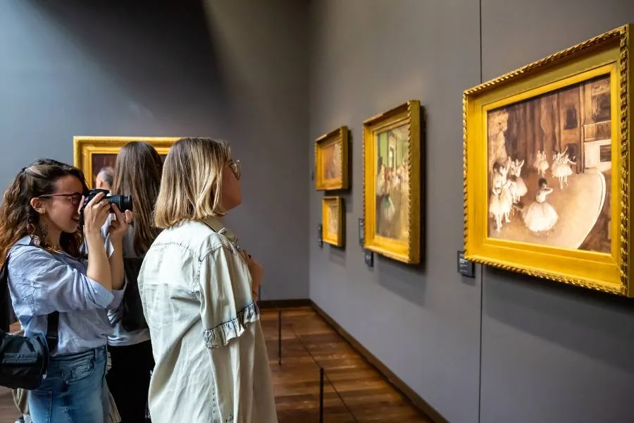People looking at art in a museum
