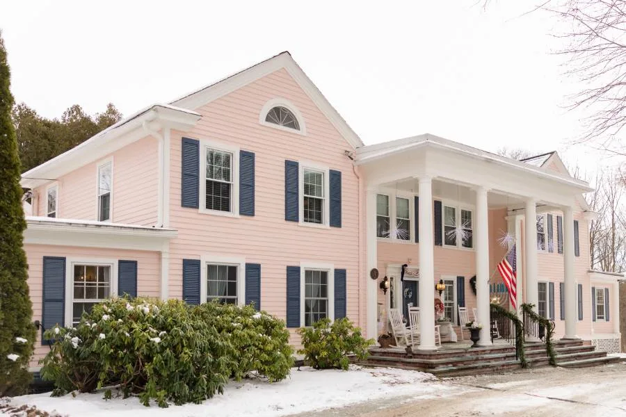 Exterior of Stockbridge Inn in winter with seasonal decor